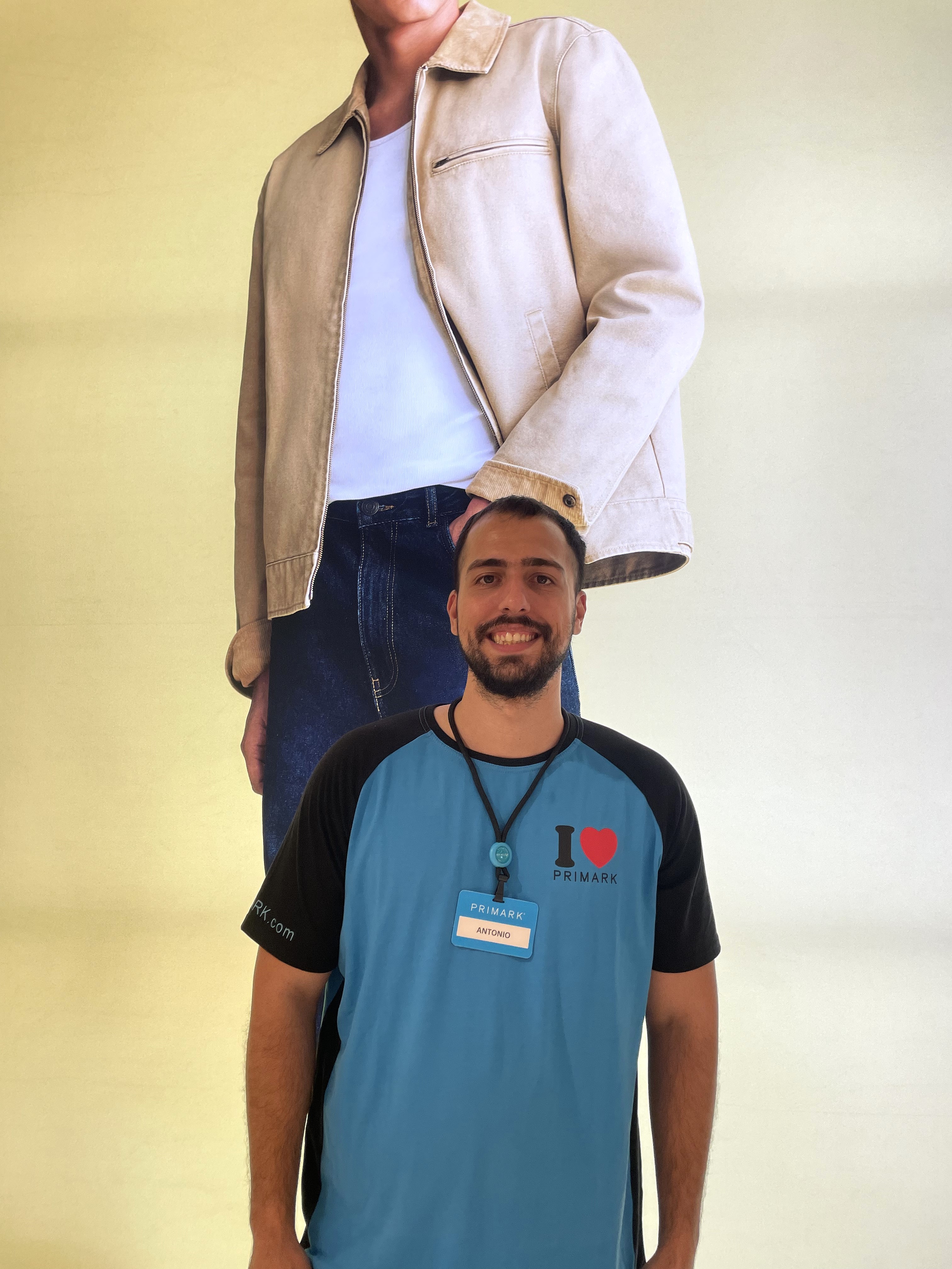 Colleague smiling at camera in store