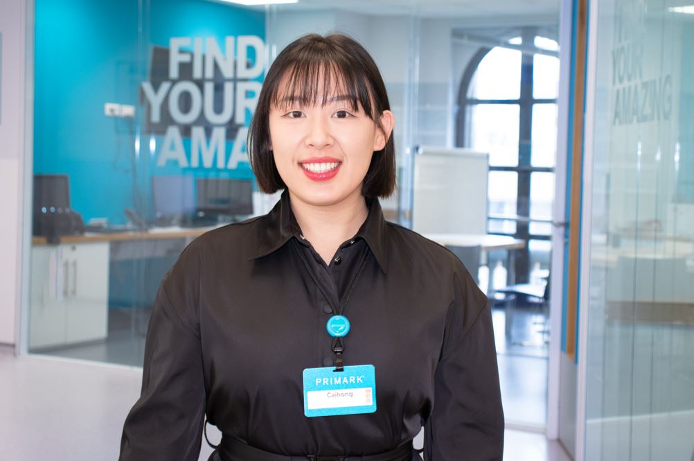 Female colleague smiling in Primark office