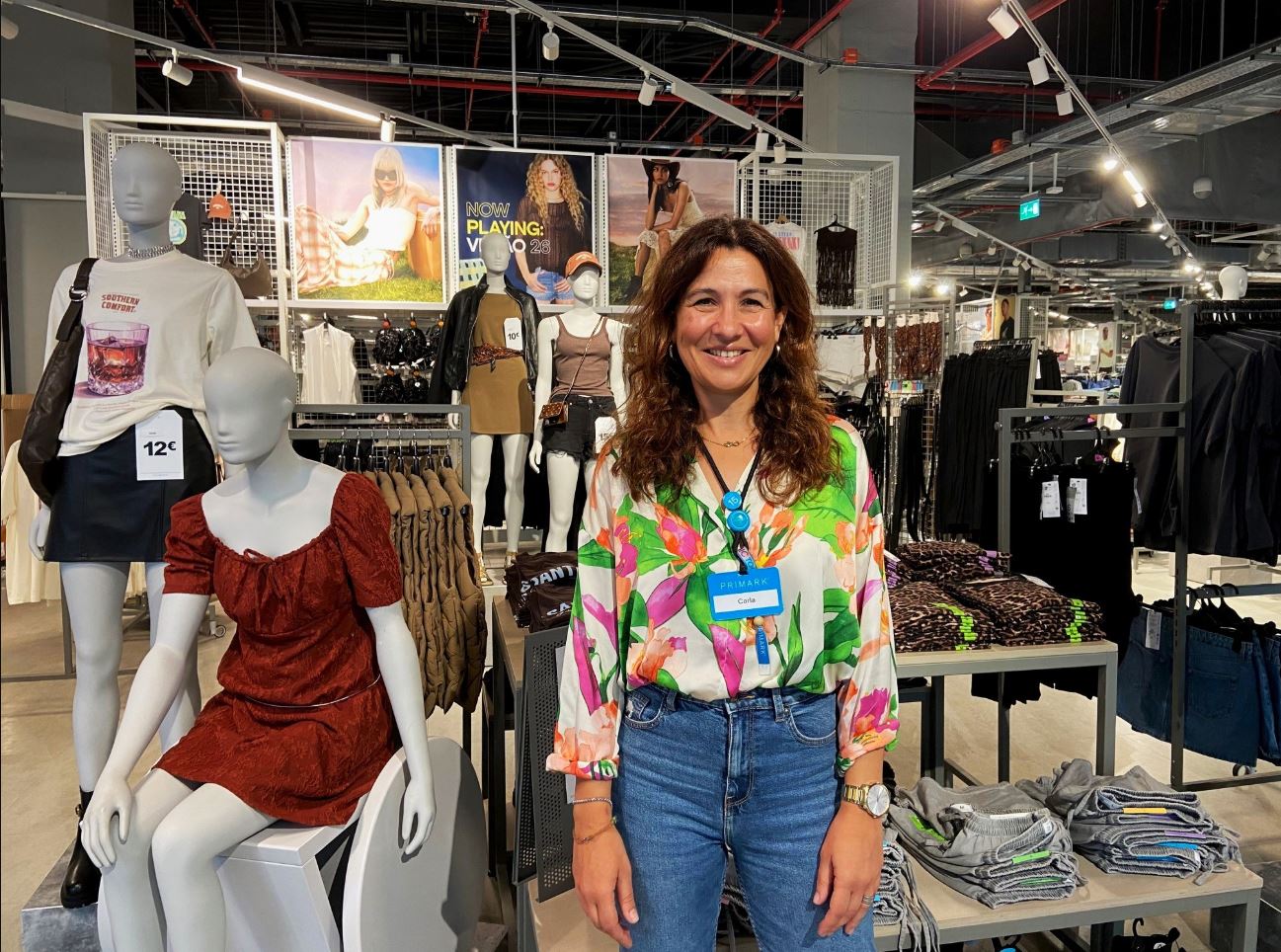 Female colleague standing in a Primark store