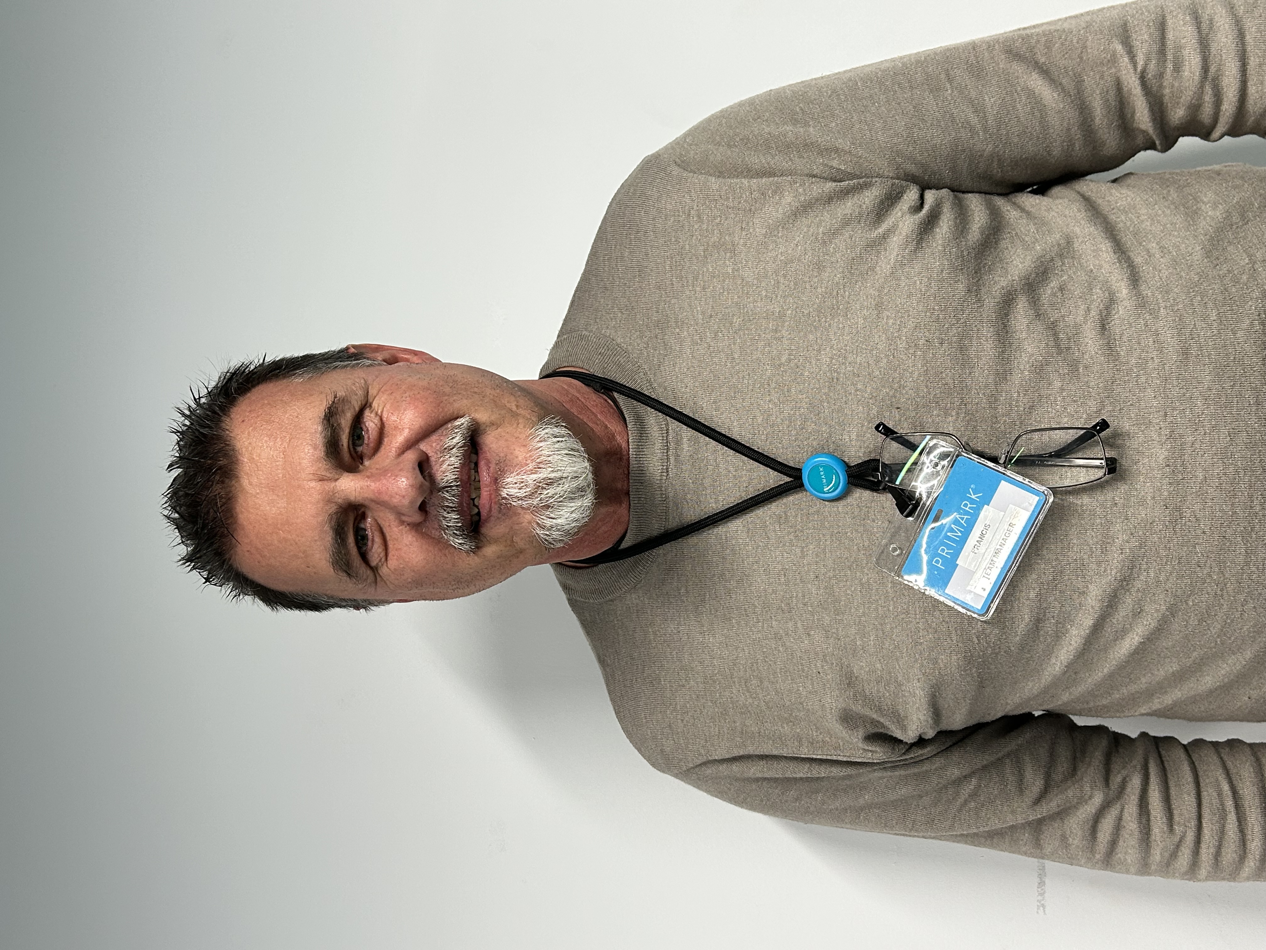 Colleague smiling in store