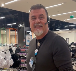 Colleague smiling in a store