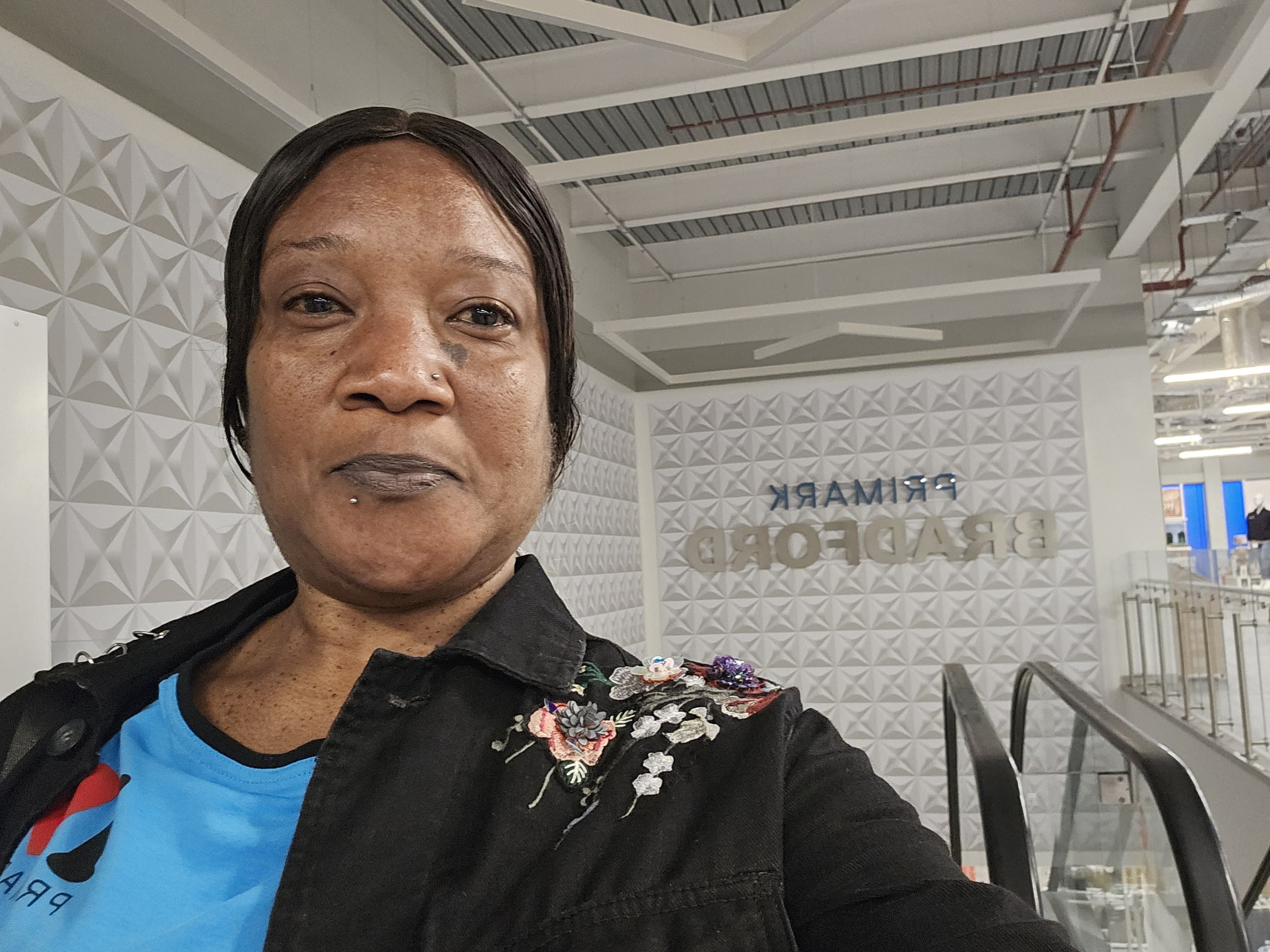 Colleague smiling in store