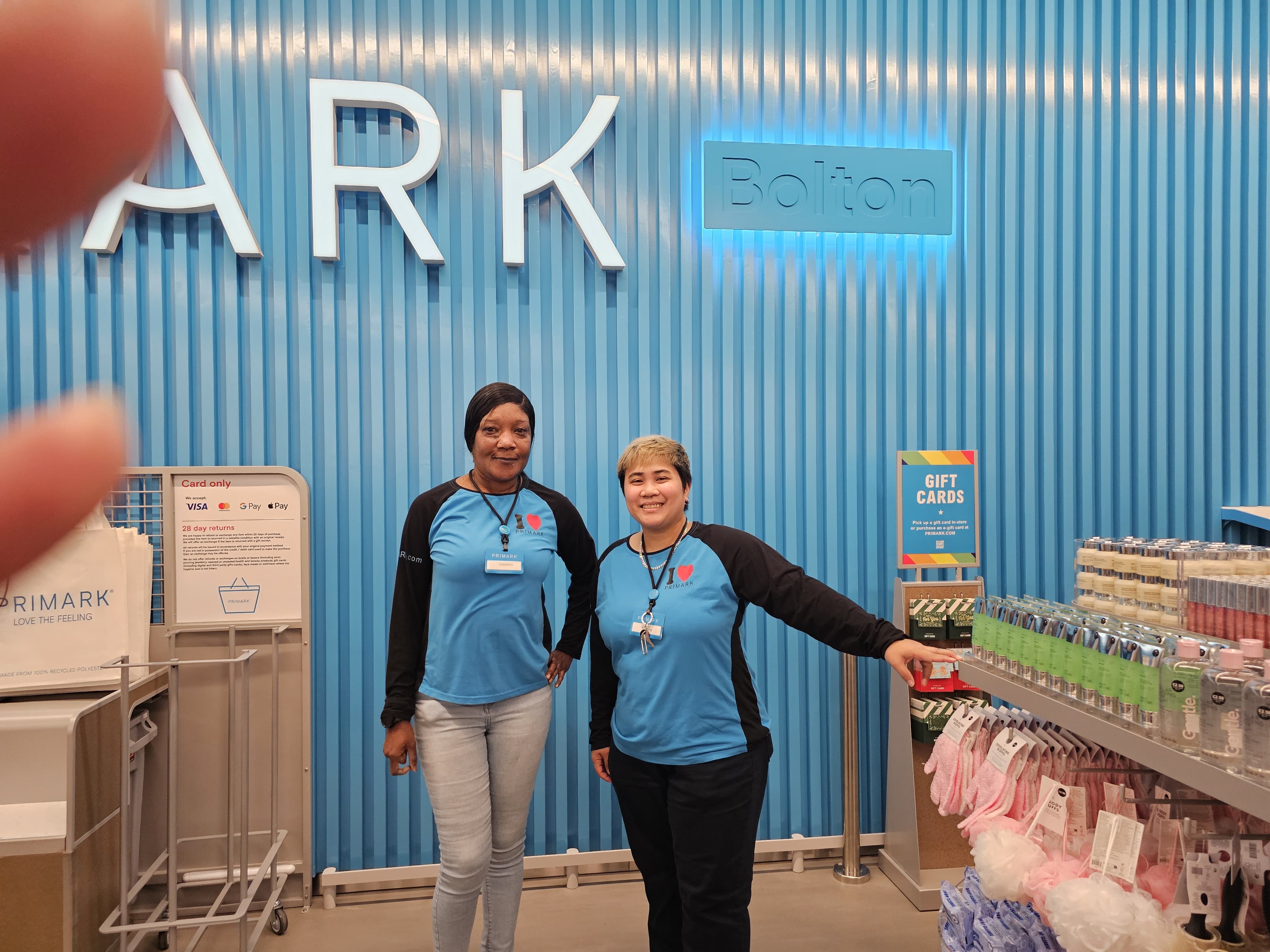 Colleagues standing together in a Primark store