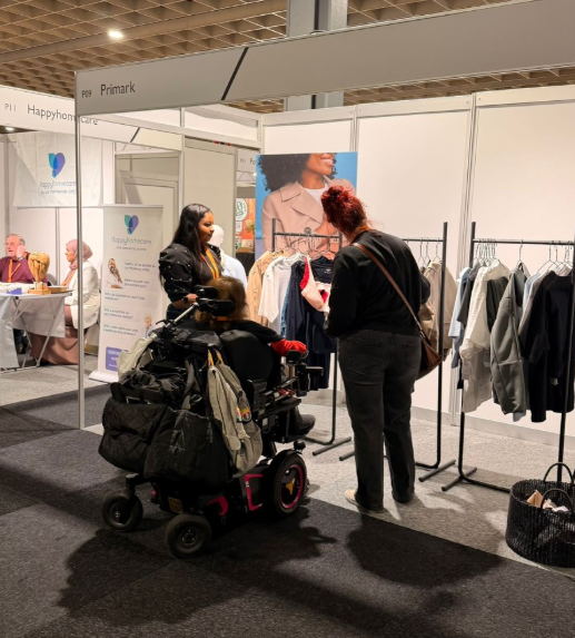 Colleague working on Primark accessibility stand and a fair