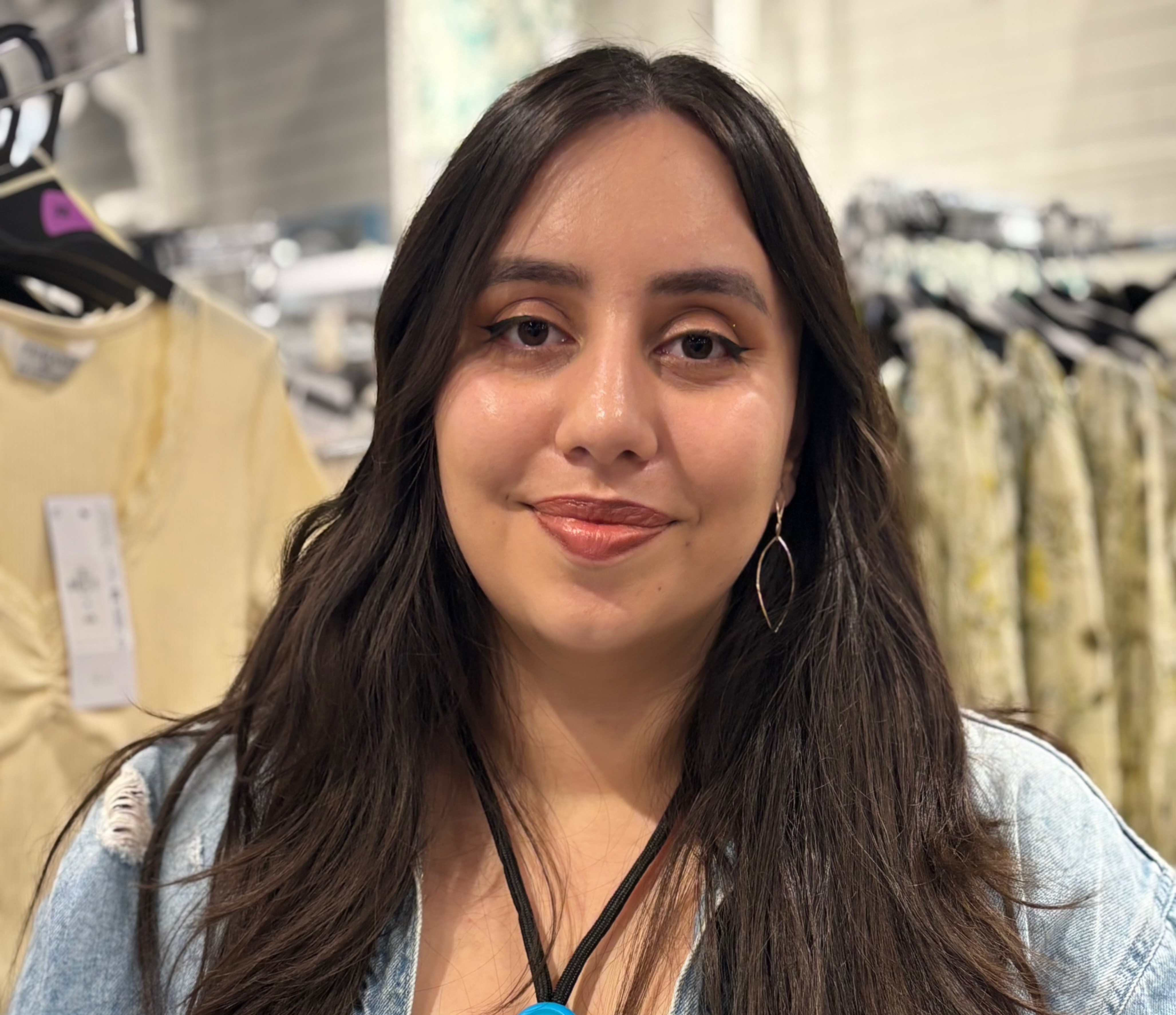 Colleague smiling in store