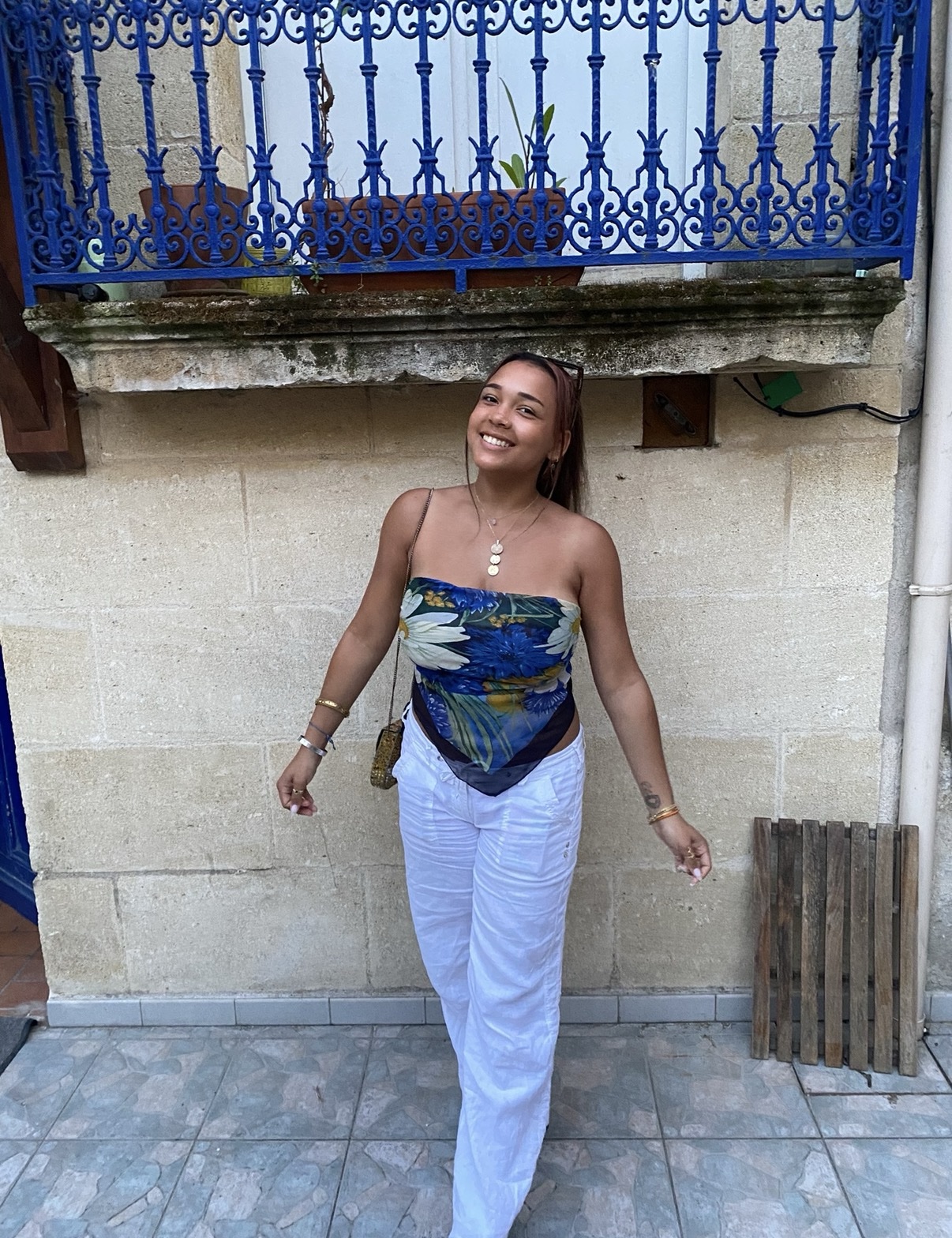 Female colleague smiling on street