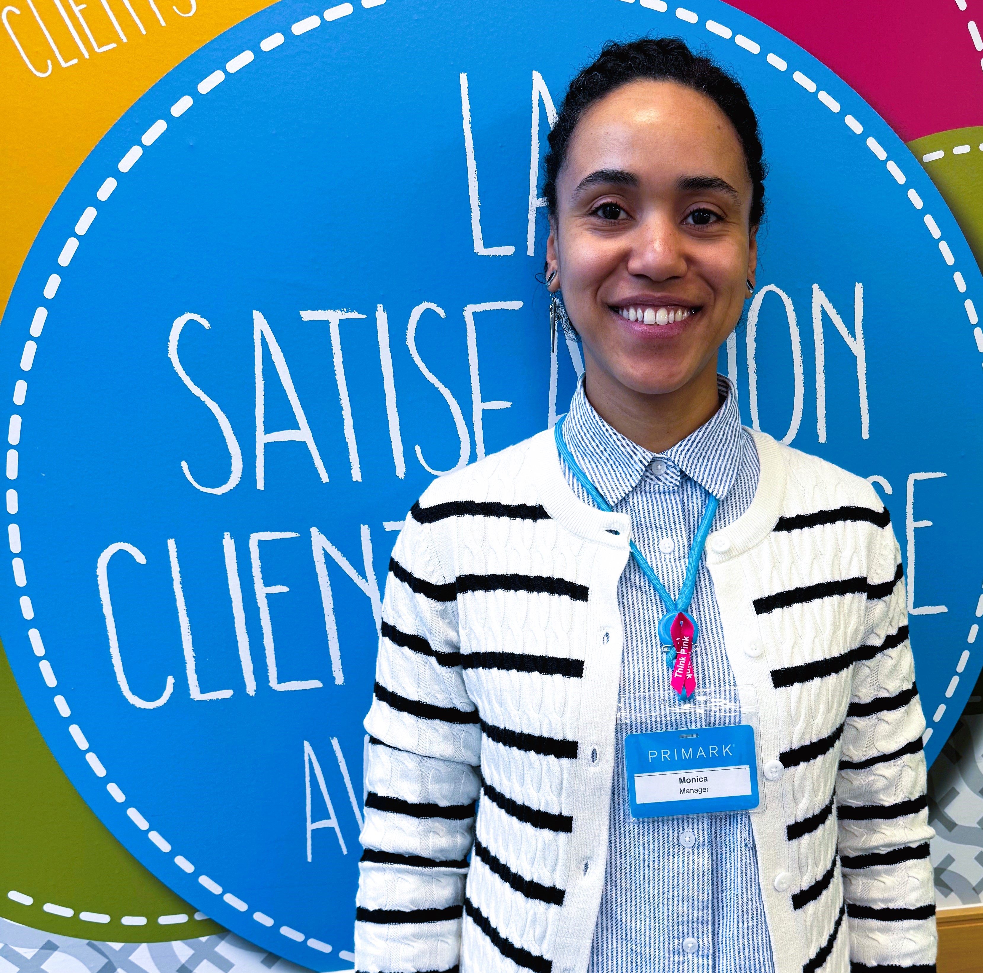 Colleague smiling in store