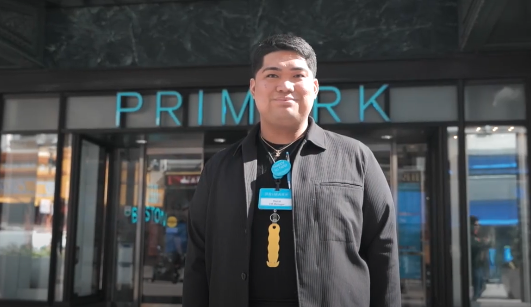 image of colleague in front of store