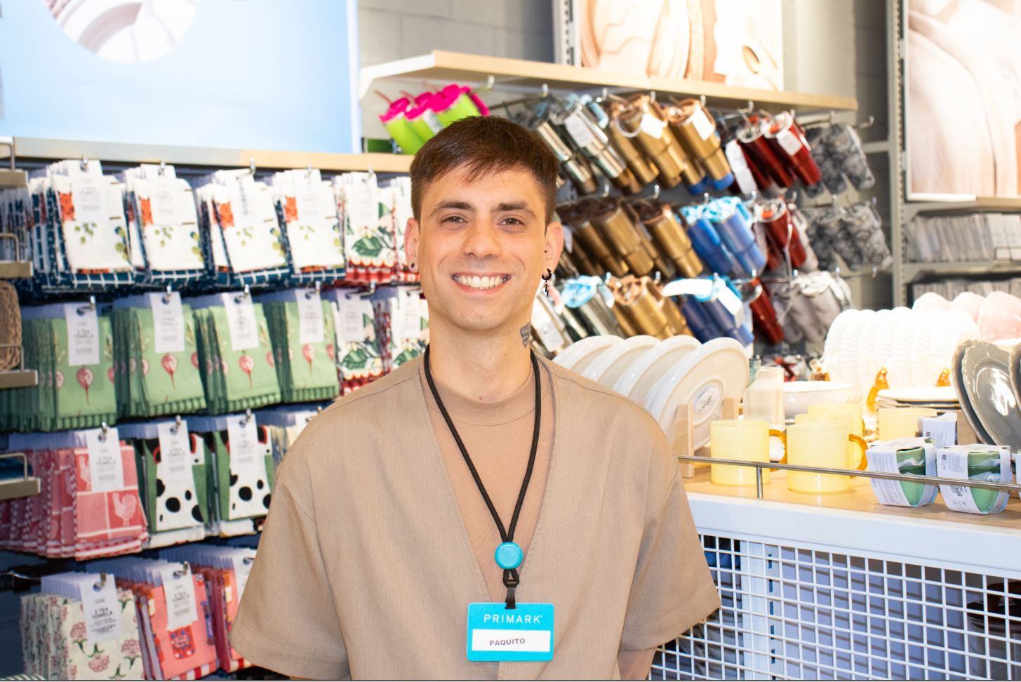 Male colleague smiling in Primark store