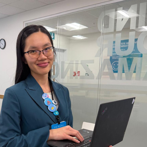 Colleague smiling with her laptop