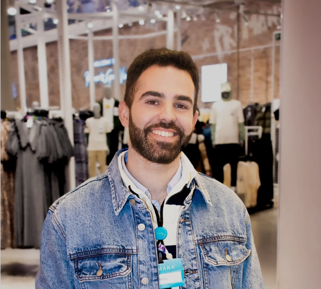 Colleague smiling in store