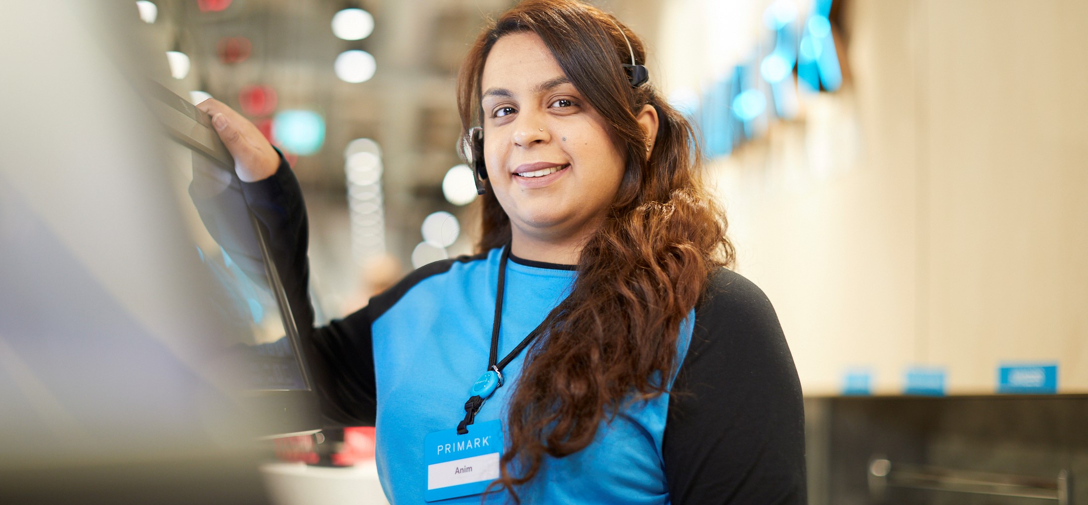 Employee holding a rob in store