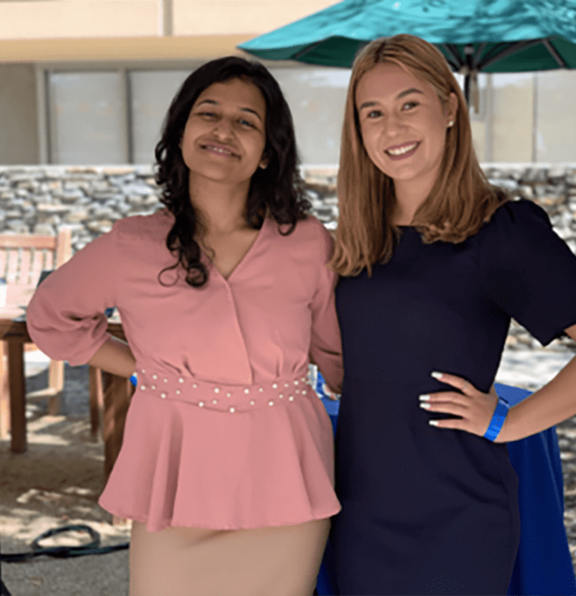 Two smiling interns