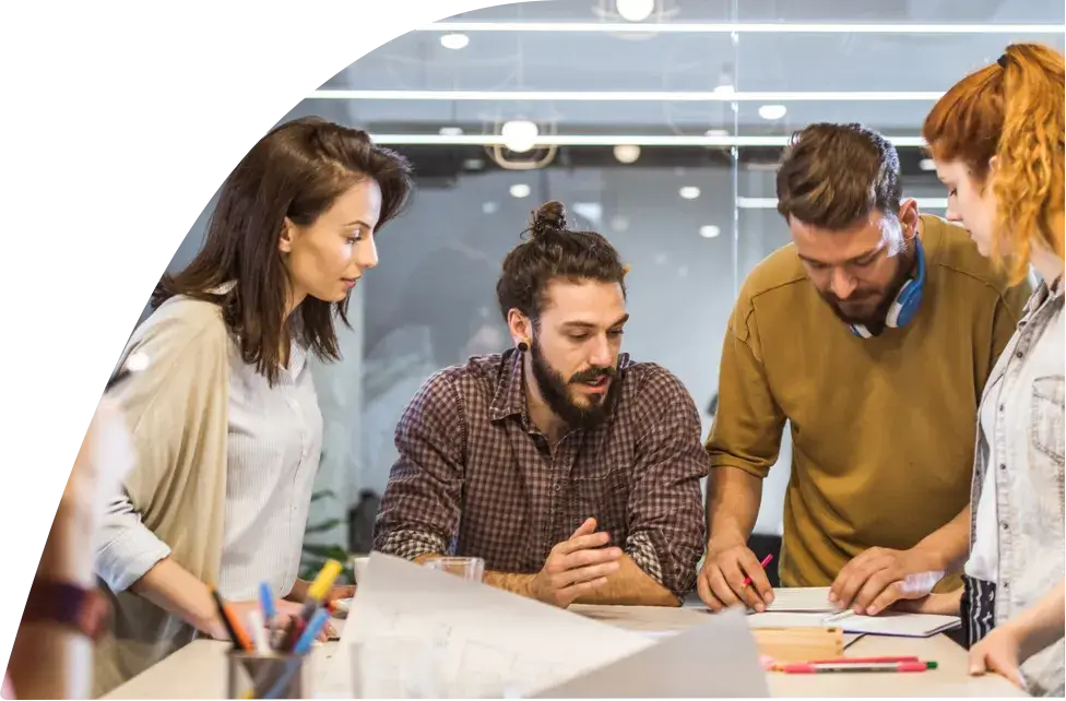 Four Amgen Employees planning a project