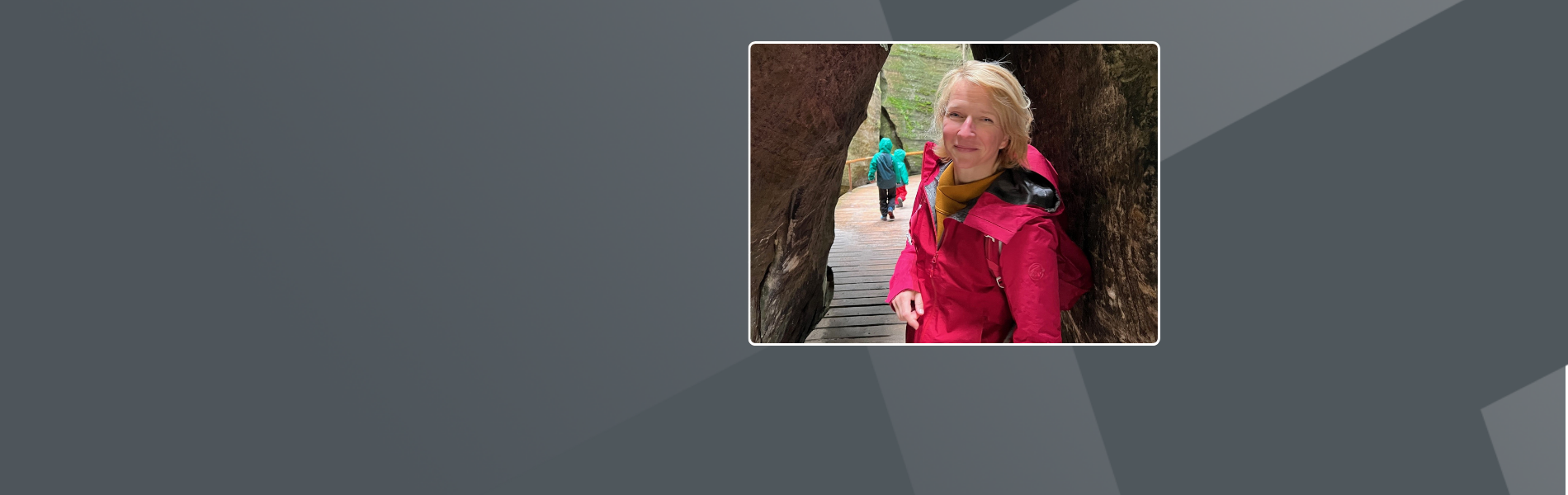 Doreen, female German, chin long blond hair, outdoor clothes, standing in a canyon..