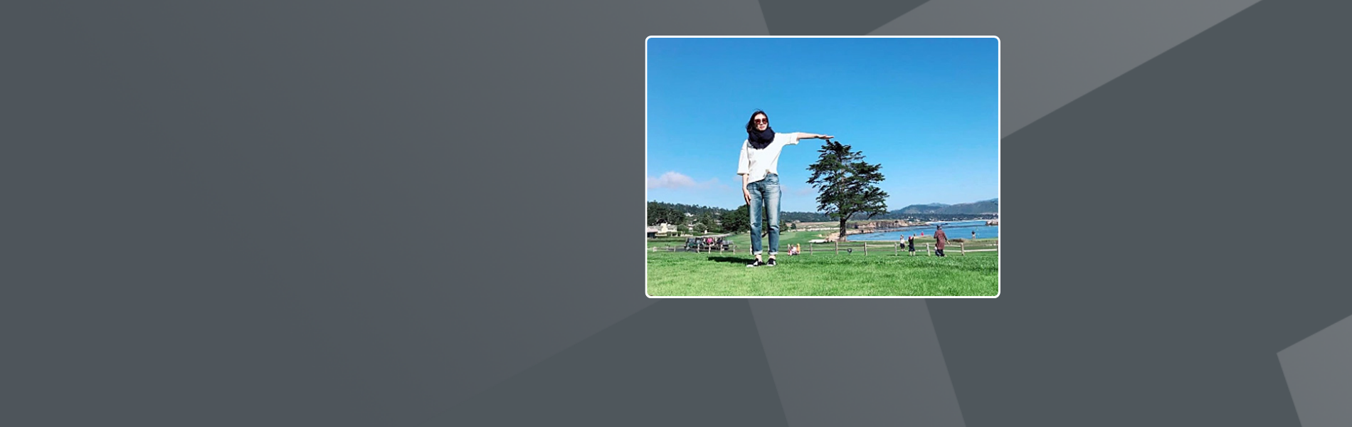 Inhye, a female Korean, standing in a park.