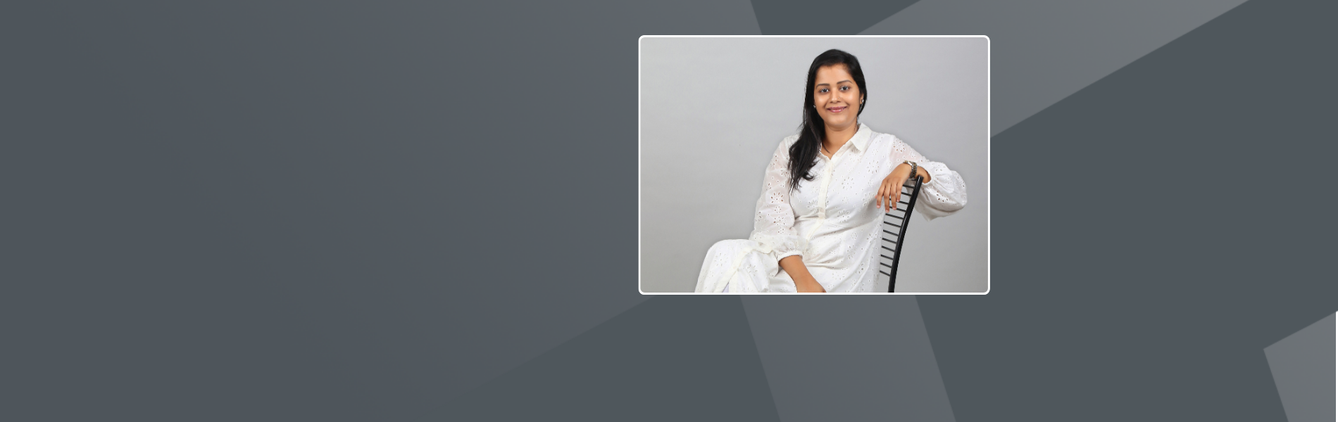 Indian Woman sitting on a chair.