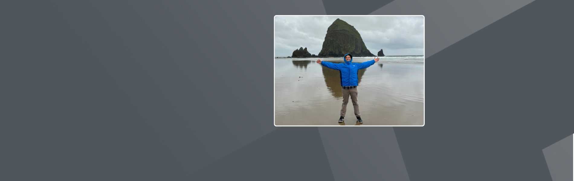 Kyle, Senior CRA, wearing a blue rain jacket and brown pants