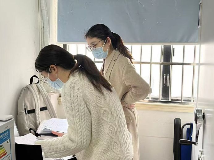 Two women are working