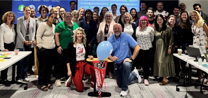 Holly Clark in a group picture at a Parexel Precision Pathway cross-functional workshop