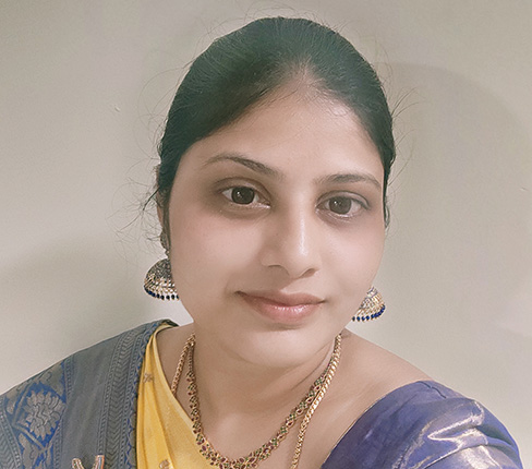 BabyRani, a female Indian and Senior Principal Statistical Programmer at Parexel, she is looking at the camera with a smile on her lips, she is wearing a sari.