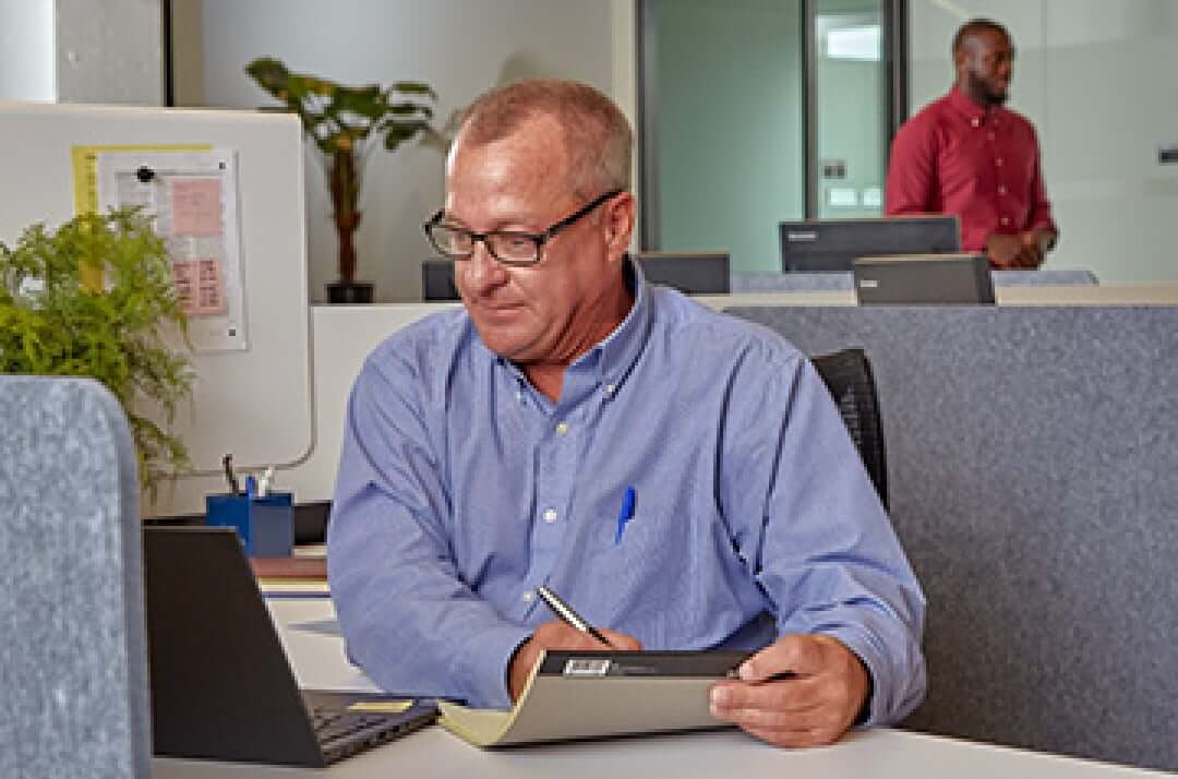 Man working in a cubicle