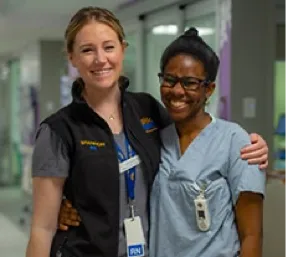 Two Nurses Hugging