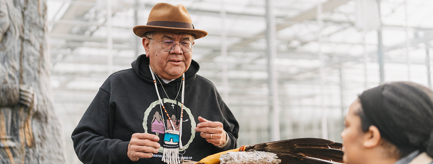 Indigenous PHSA employee working with a client