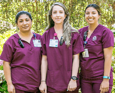three nurses posing