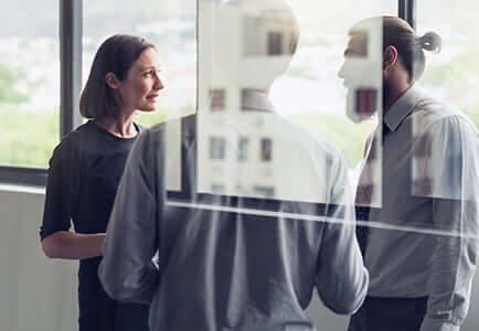 small group of employees meeting outside their offices