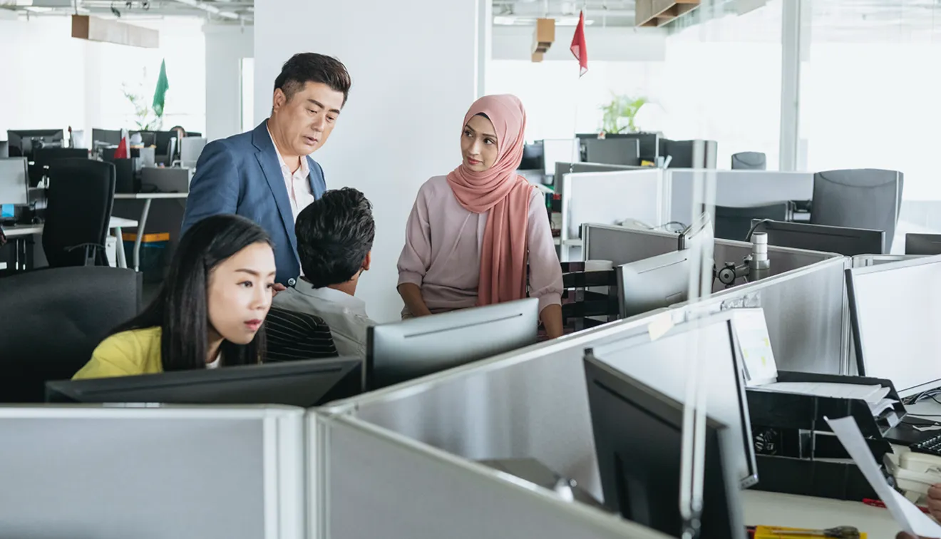 Team collaboration in open-plan office