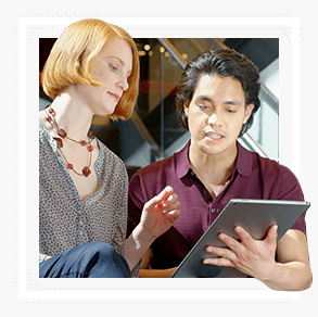 Man with tablet is sharing with a woman
